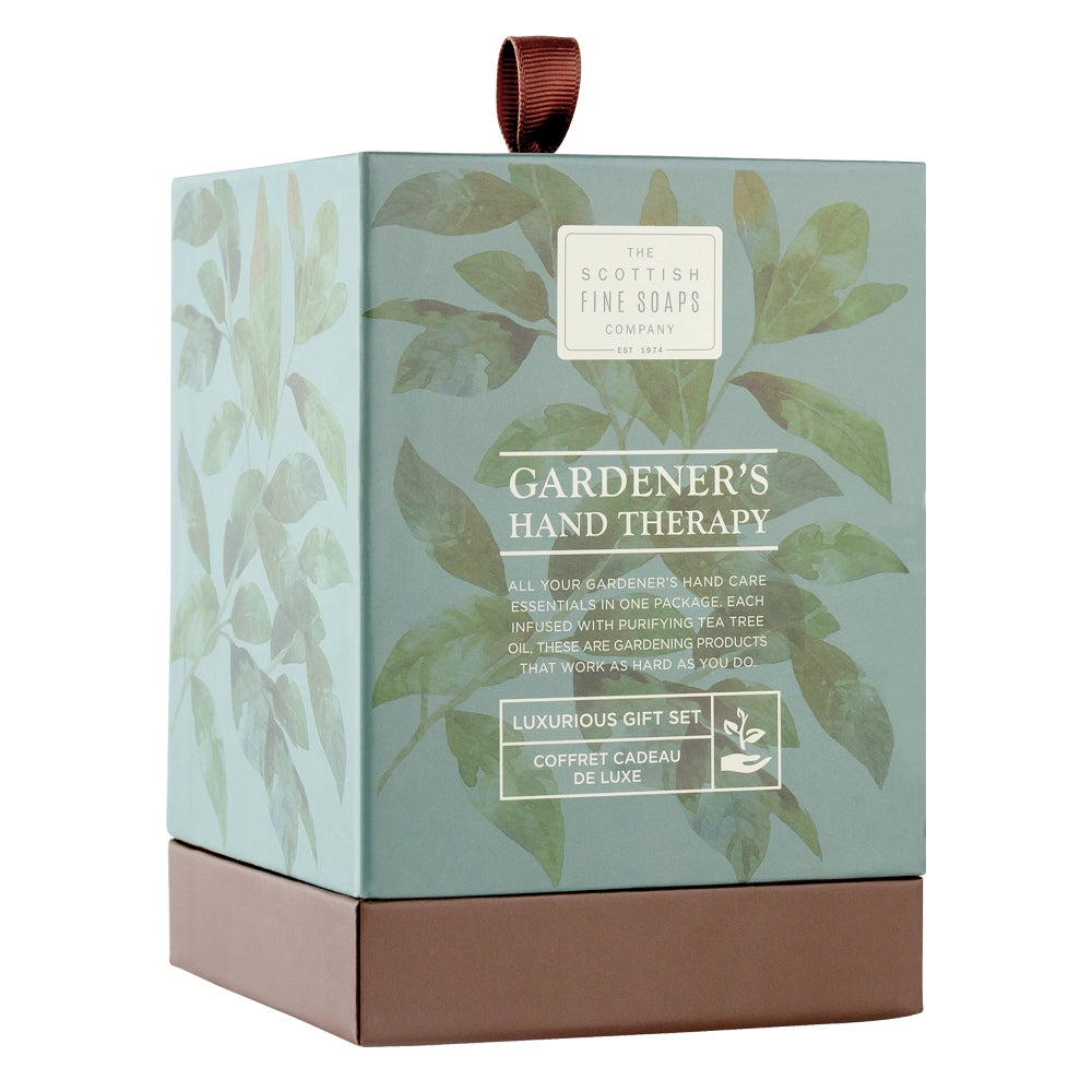 Gardener's Hand Therapy gift set packaging with leaf design and brown ribbon.