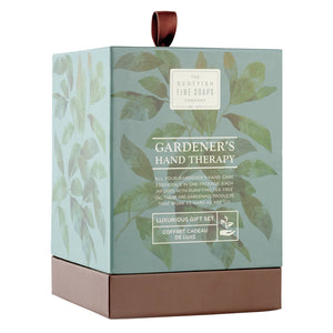 Gardener's Hand Therapy gift set packaging with leaf design and brown ribbon.