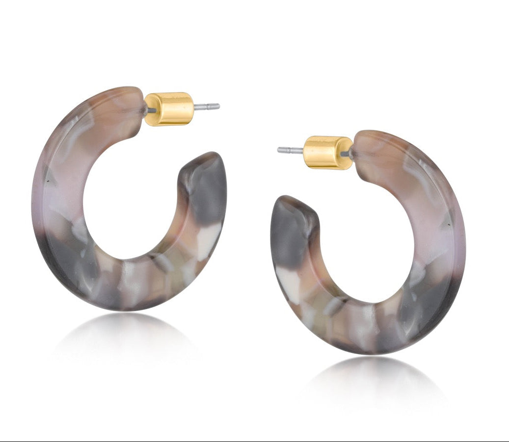 Hoop earrings with tortoiseshell design on a white background