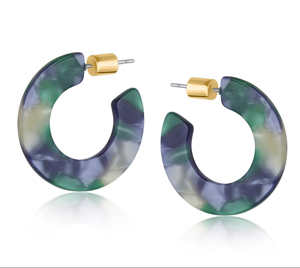 Hoop earrings with a marbled design in purple and green on a white background