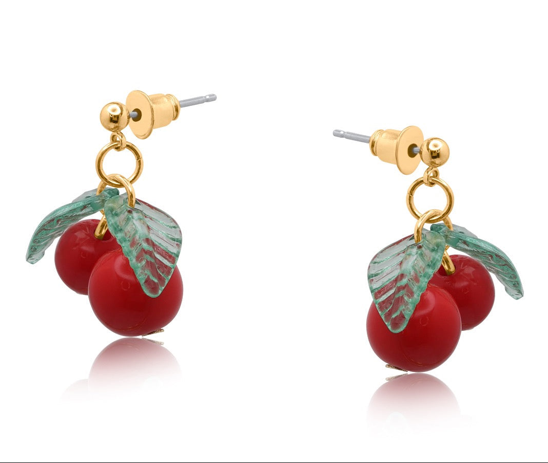 Cherry-themed earrings with gold accents on a white background