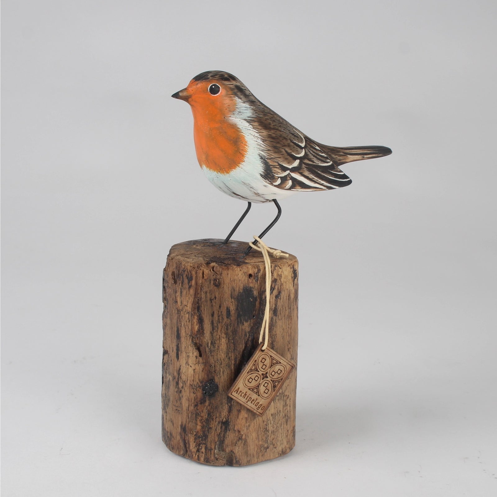 Hand Carved Wooden Robin on a Log by Archipelago