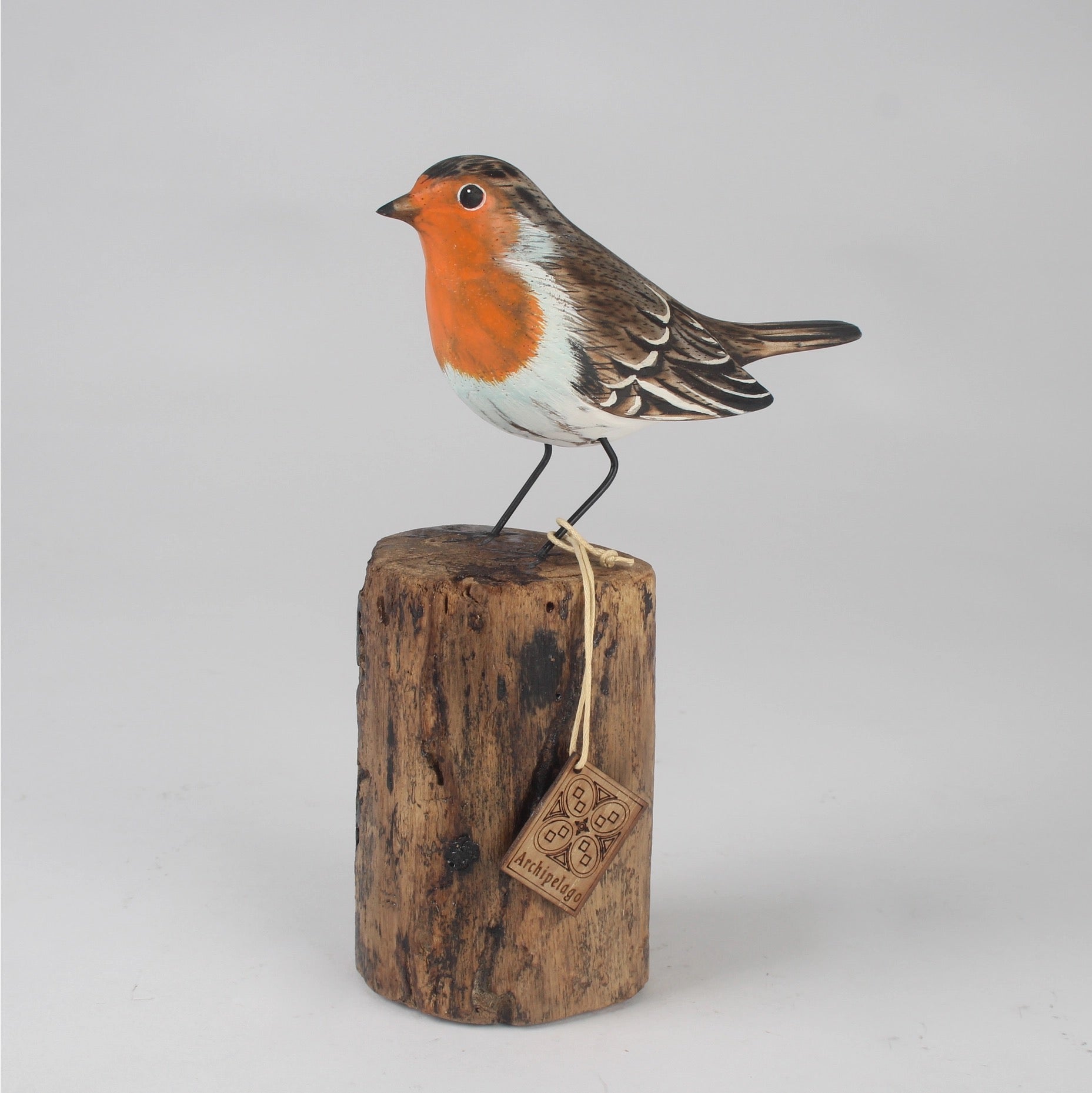 Hand Carved Wooden Robin on a Log by Archipelago