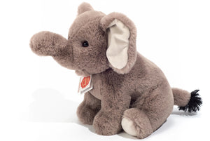Plush elephant toy on a white background