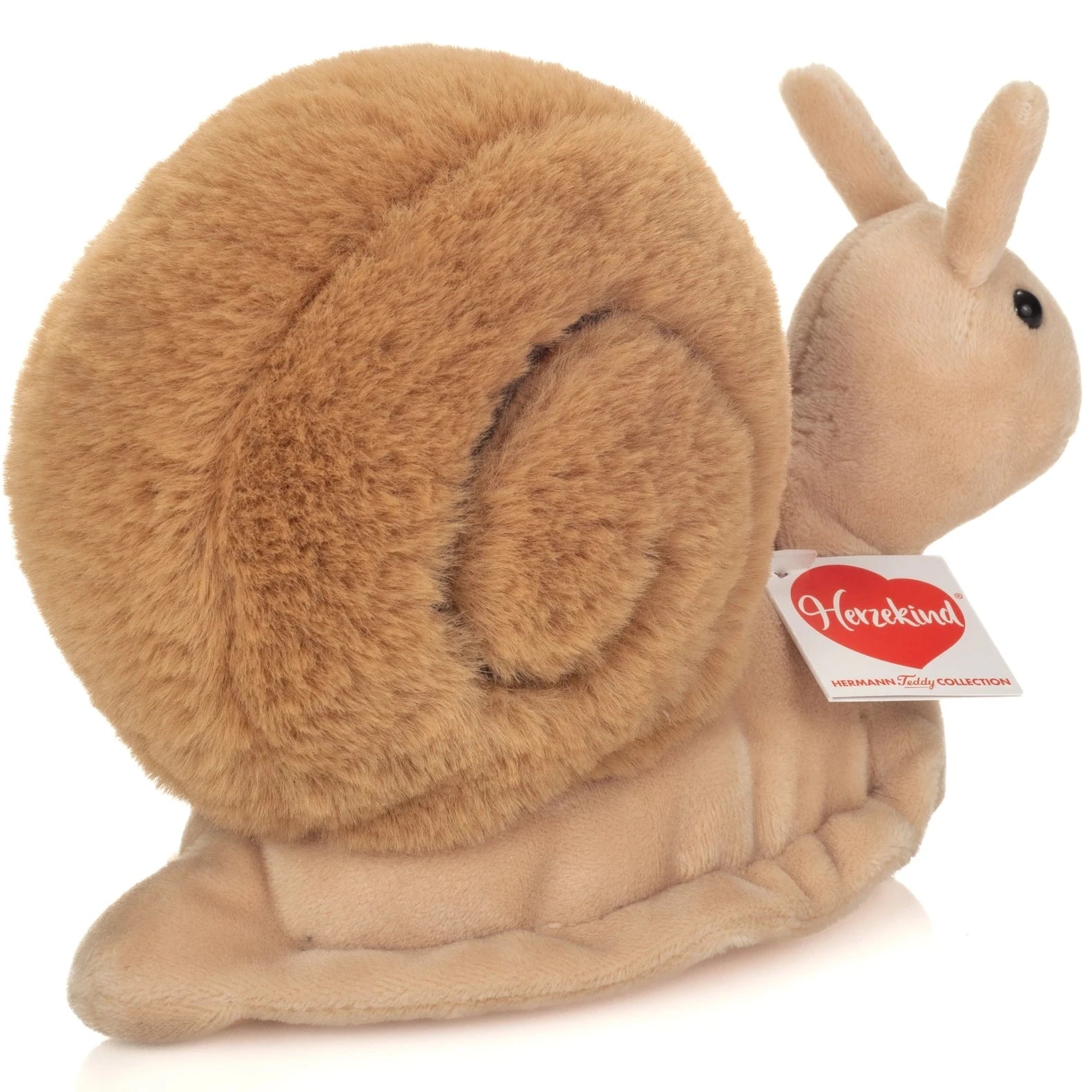 Plush snail toy with a visible brand tag on a white background