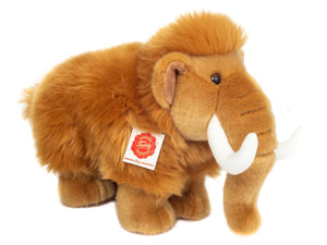 Plush toy mammoth with ginger fur and white tusks