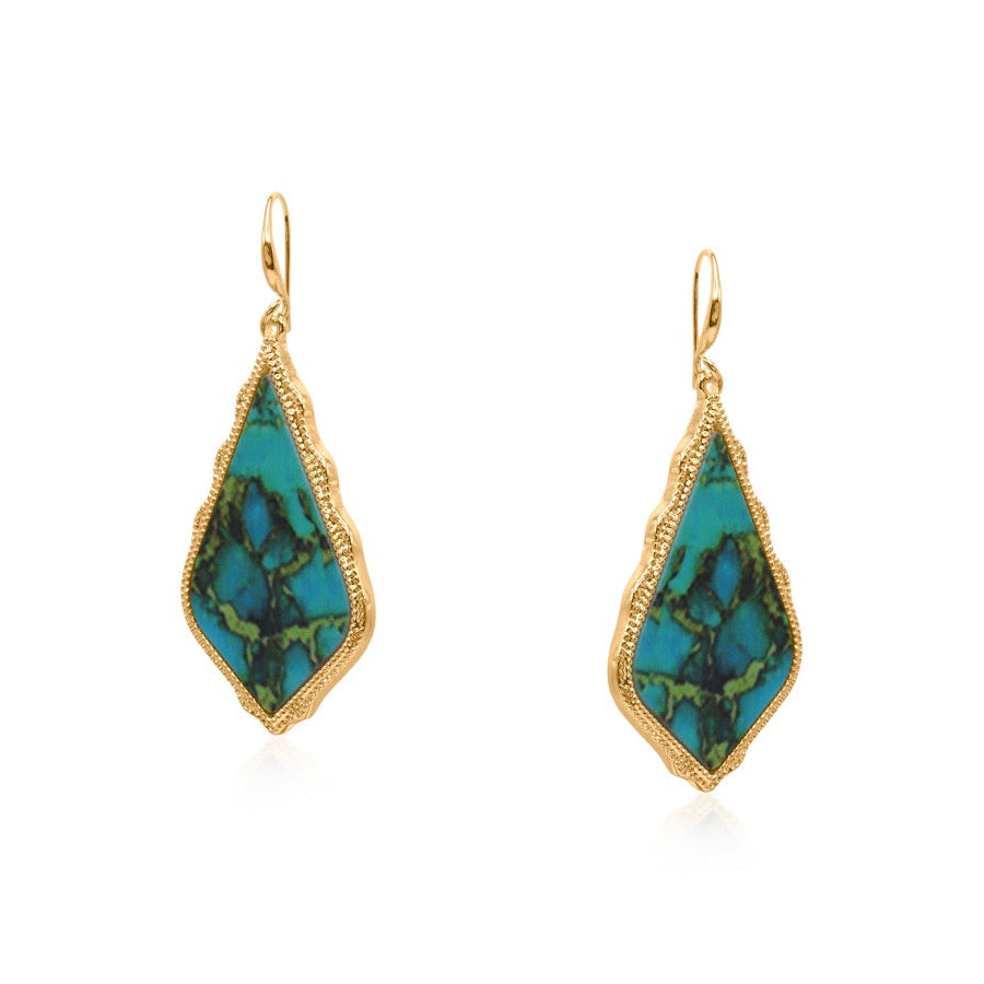Gold-framed turquoise earrings on a white background