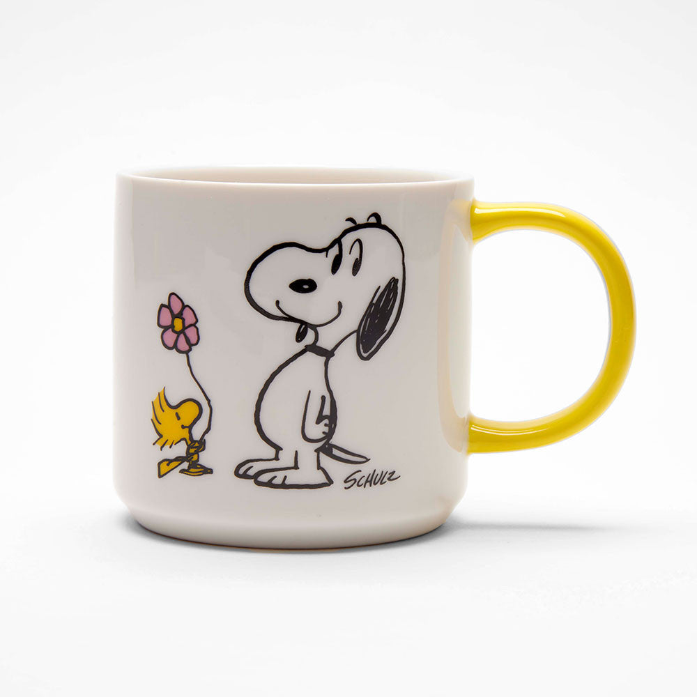 Mug with cartoon character design on a white background