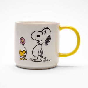 Mug with cartoon character design on a white background