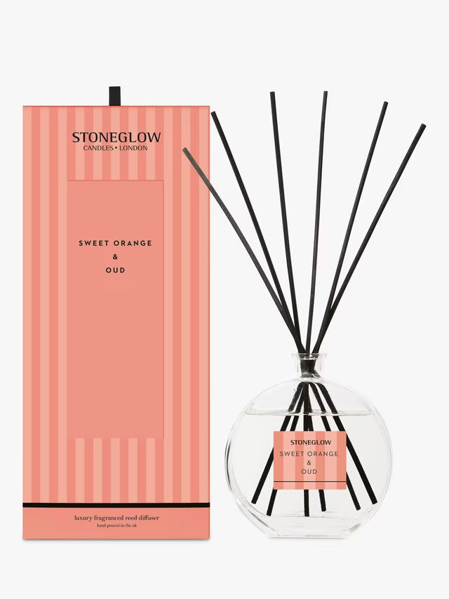 Stoneglow Sweet Orange & Oud diffuser with packaging on a white background