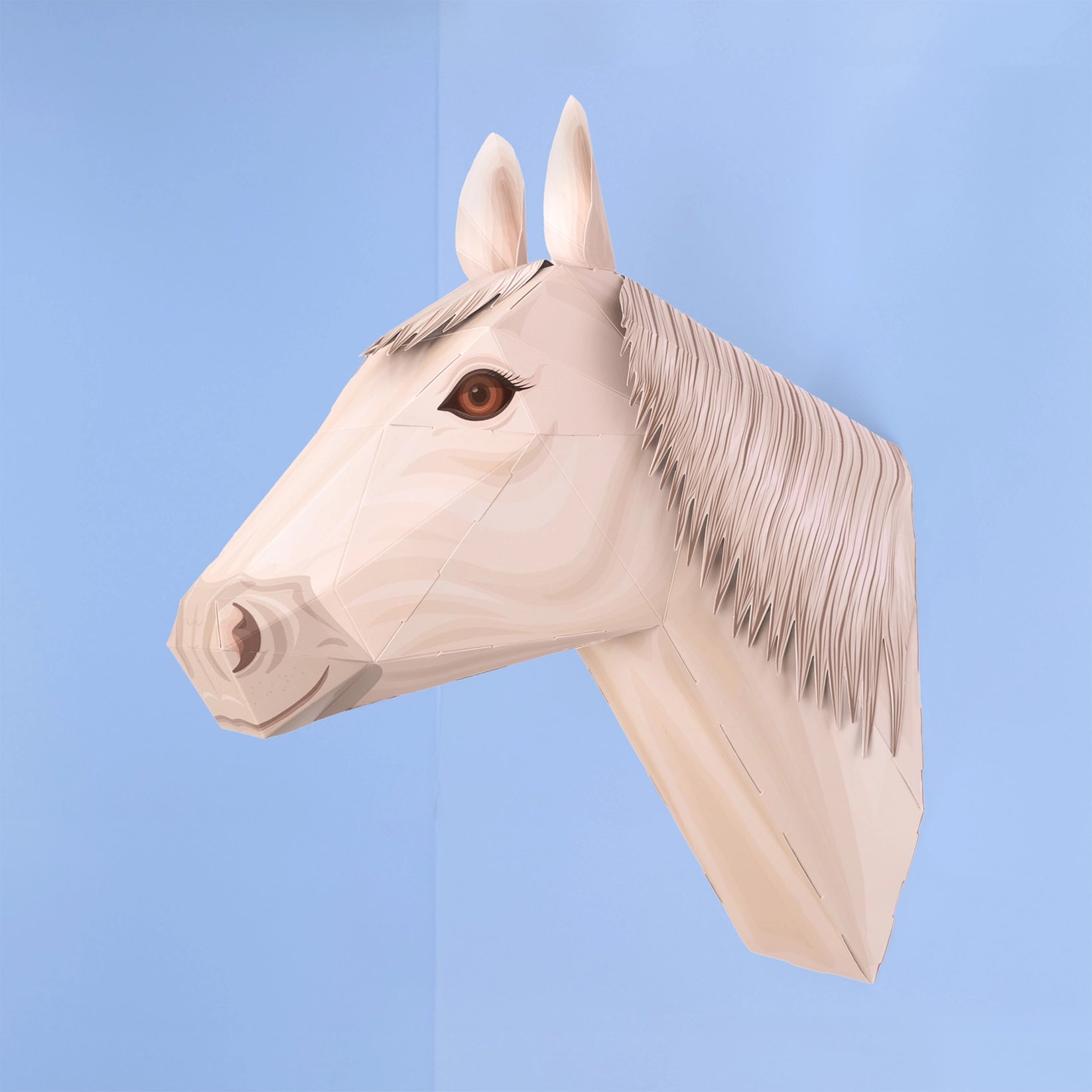 Horse head sculpture against a light blue background